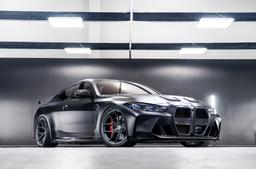 Vesser VSR7 Gloss Candy Violet alloy wheel mounted on car in an atmospheric setting