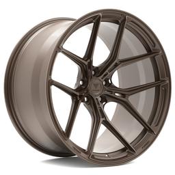 Vesser VSR7 Satin Bronze-Green Chameleon alloy wheel mounted on car in an atmospheric setting