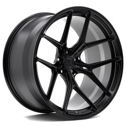 Vesser VSR7 Satin Bronze alloy wheel mounted on car in an atmospheric setting